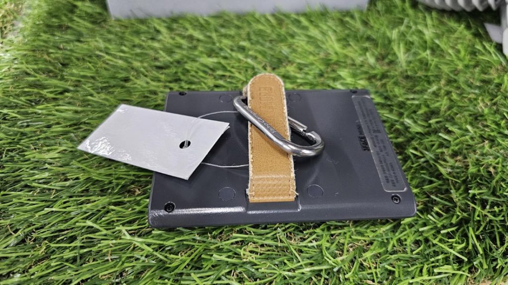 Rear view of the CLAYMORE 3Face Mini showing its leather hanging strap and metal carabiner
