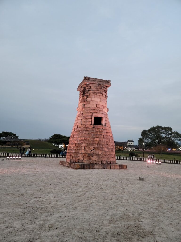 The historic Cheomseongdae stone astronomical observatory standing under a clear sky in Gyeongju.
