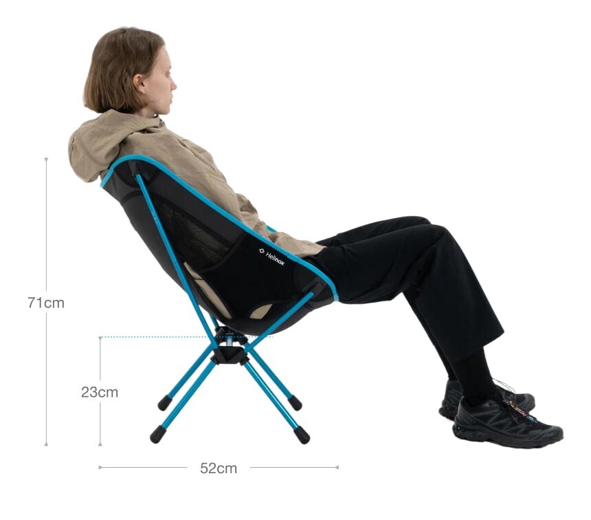 A size guide showing the height, width, and weight specifications of the Helinox Chair One RE camping chair.
