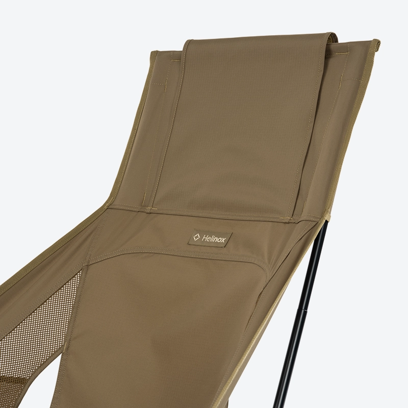 Close-up of the comfortable high backrest fabric on the Helinox Sunset Chair re.