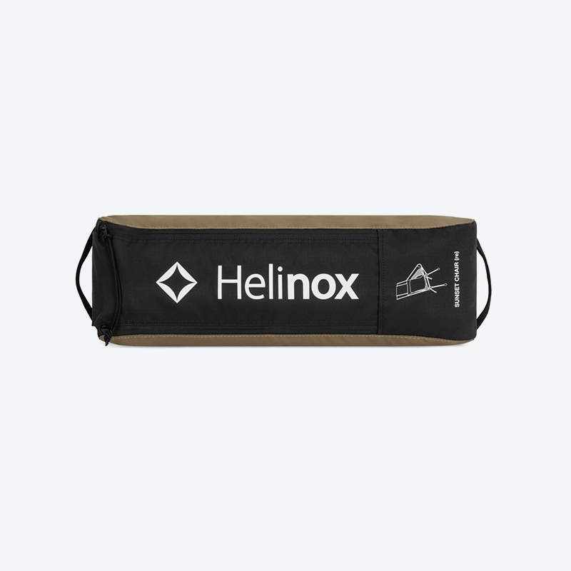 The Helinox Sunset Chair re packed compactly inside its zippered carry bag.
