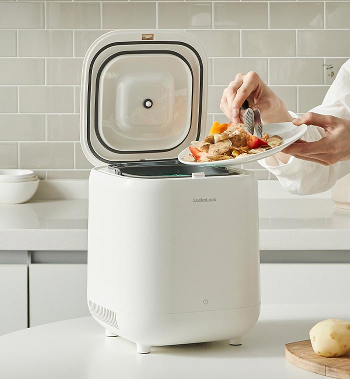 Food waste being stored inside the white LocknLock Food Waste Refrigerator.