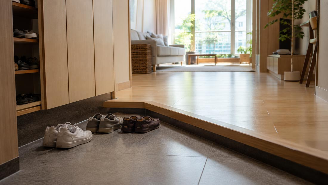Clean Korean home with shoes left at the entrance and a spotless shoe-free apartment interior